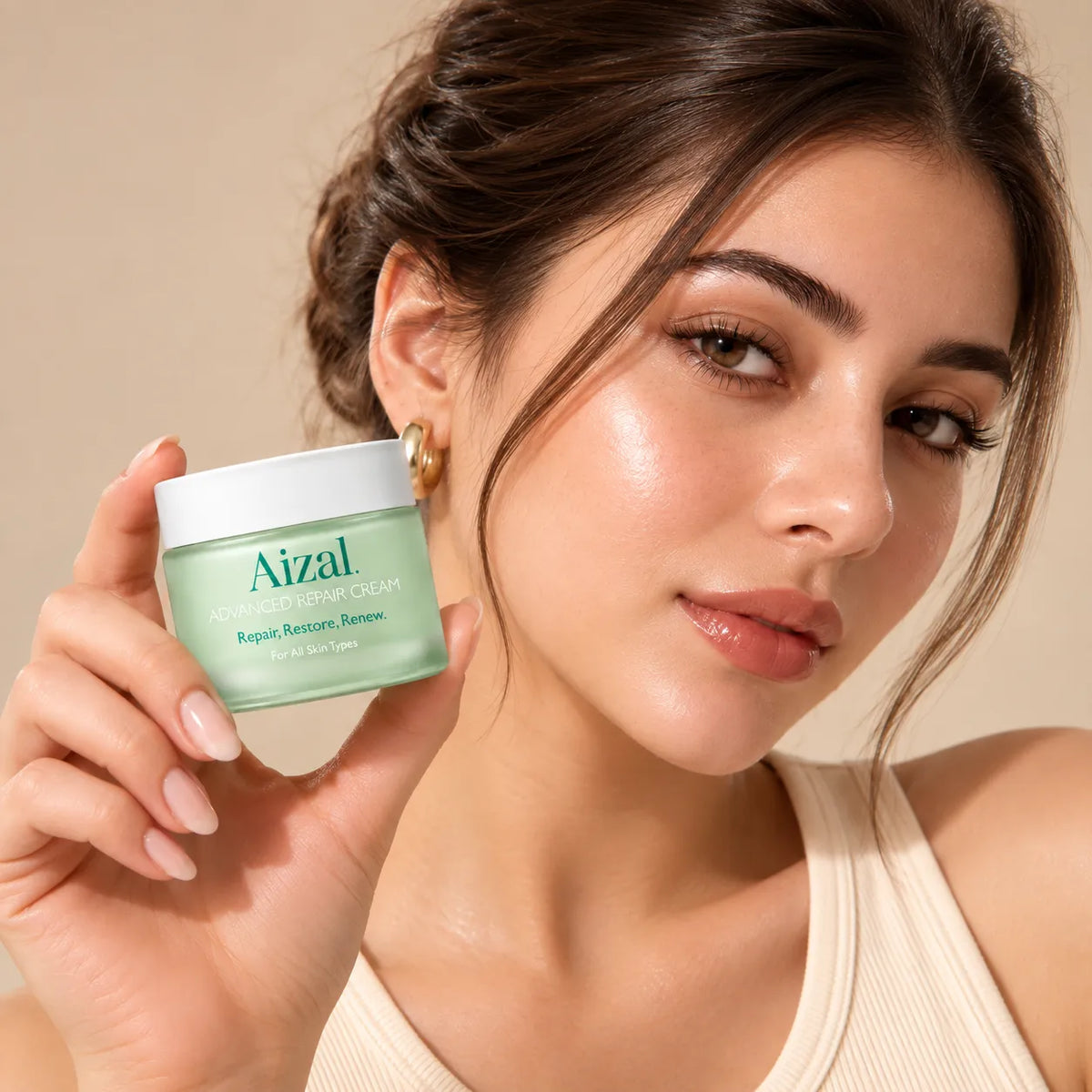 A woman holds a small jar of Repair Plaster Cream in her hand, with her face partially visible in a close-up shot against a warm beige background.